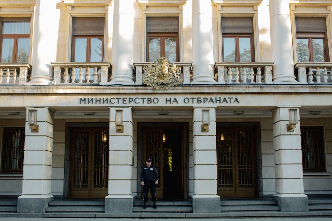The ministry of defense building stands with a guard.